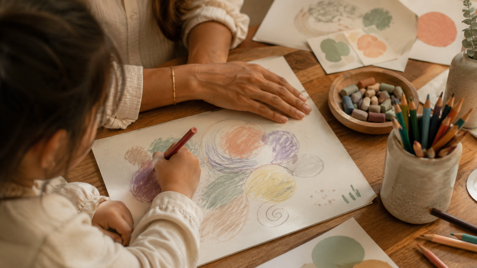Child drawing abstract feelings with colour